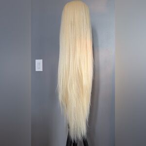 13 x 3 x 1 middle part platinum/613 synthetic wig. 40 inches. Lace cut